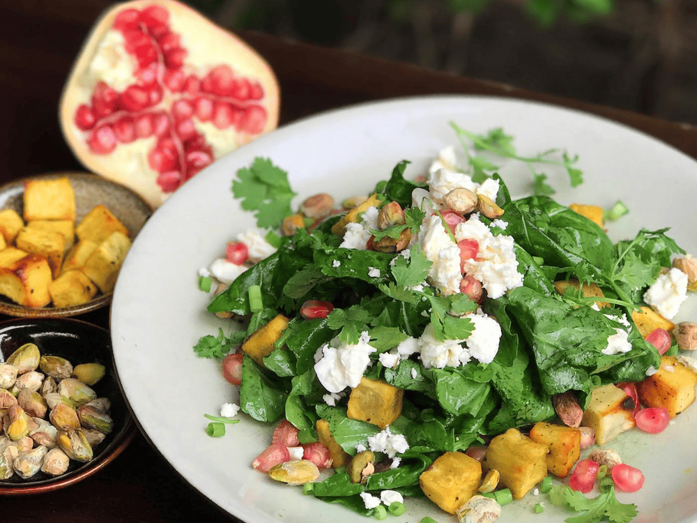 Clearly marked vegetarian dishes throughout the menu, including creative salads, sandwiches with roasted vegetables and creamy avocado sauce (Source: The Hanoi Social Club)